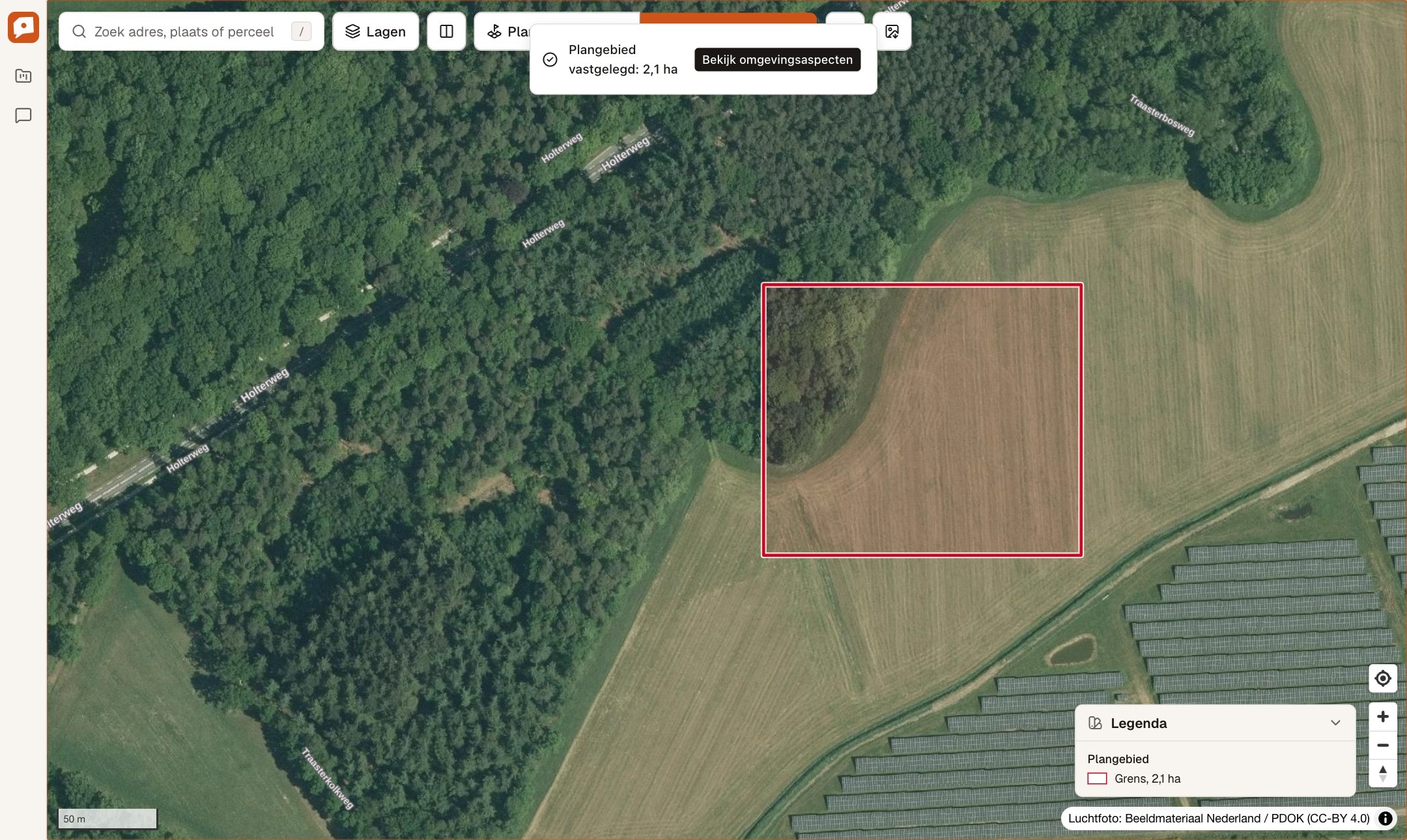 Een getekend plangebied van 2,1 hectare in rood op de luchtfoto, met de knoppen Plangebied en Omgevingsaspecten erboven.